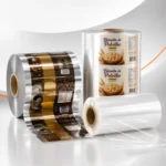 Bobinas de filme de polipropileno PP, CPP e BOPP transparentes, metalizadas e impressas para embalagens flexíveis em composição fotográfica de estúdio.