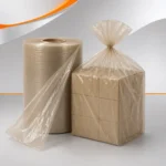 Bobina e saco de polietileno recuperado cristal canela utilizados para embalar caixas de papelão, ideais para proteção, armazenamento, transporte e aplicações industriais.