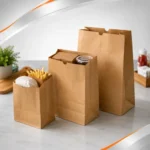 Três sacos de papel kraft para alimentos em diferentes tamanhos, indicados para delivery, padarias, lanchonetes, restaurantes, cafeterias e embalagens de alimentos.